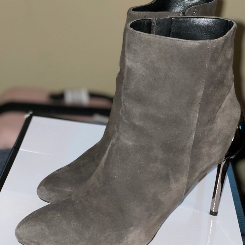 Suede boots w/Metallic heel $25 each BLACK ONLY